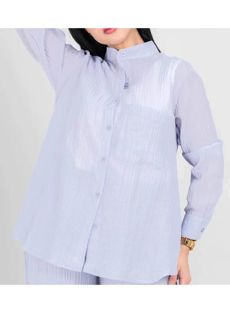 اكسا طقم عصري من قطعتين، قميص وبنطال بلون موحد، قماش شفاف